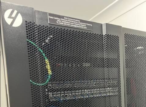 Vertiv cabinet top with Peak fibre panel and labelled ports