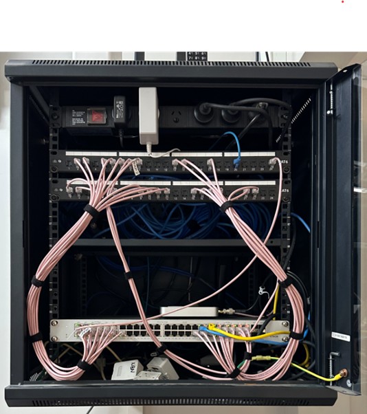 After — clean cabinet, cables bundled, dressed and labelled, regional Perth WA